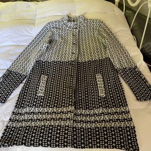 Unlined acrylic coat. Wash gentle. Flat dry